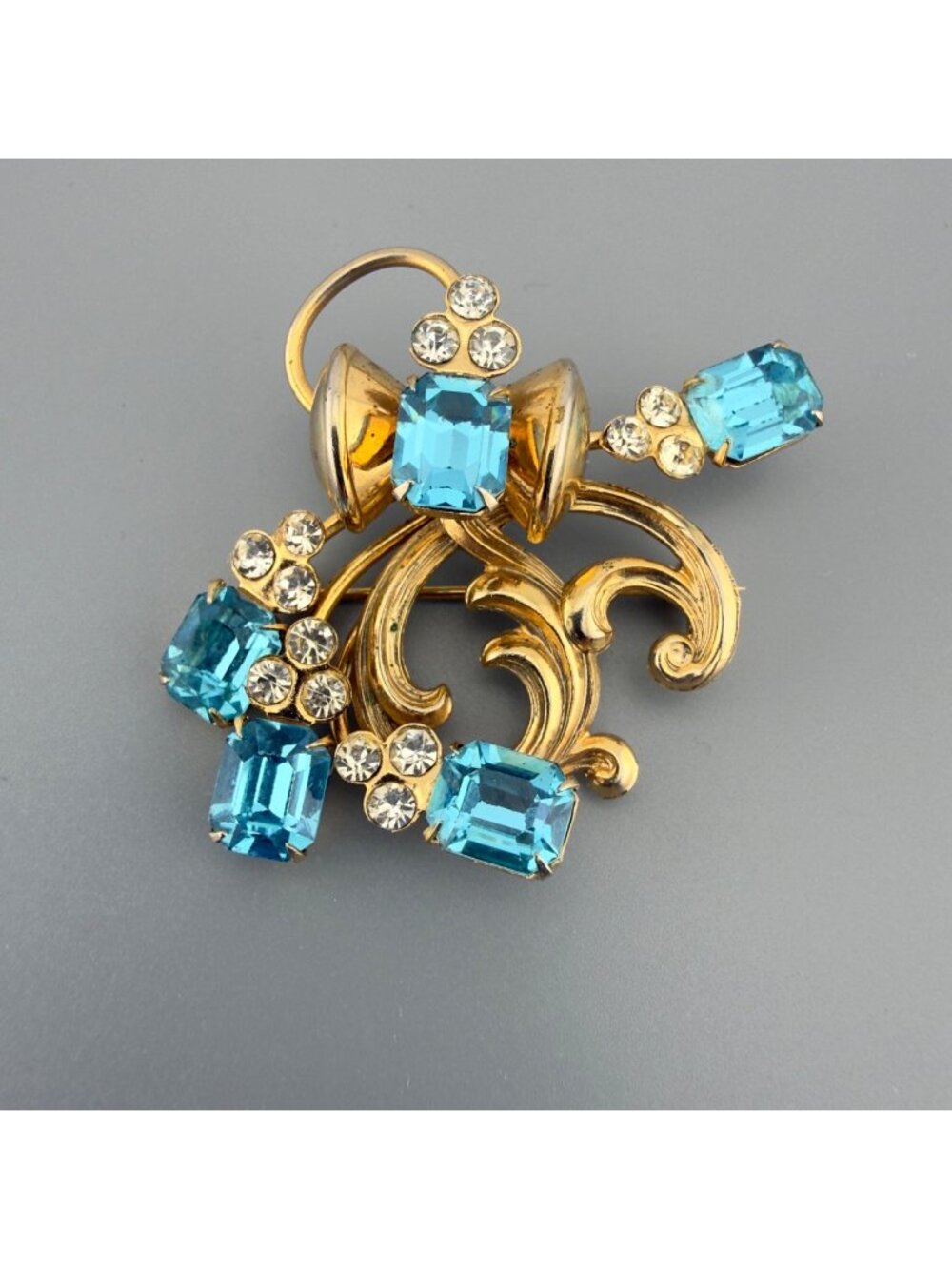 Vintage Aqua Blue Rhinestone Brooch Pendant Gold Tone Emerald Cut Glass